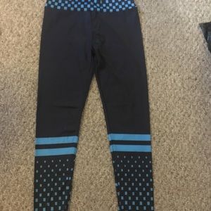 small black and blue yoga pants
